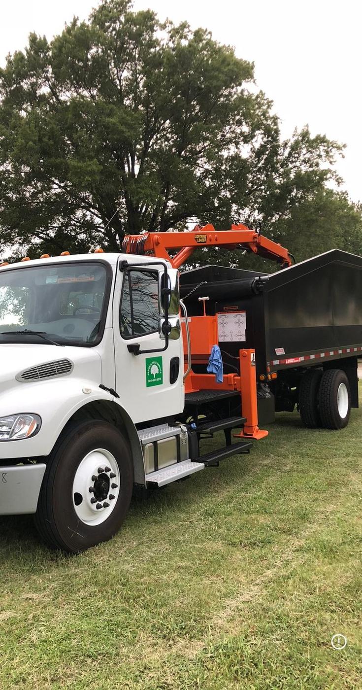 Bucket truck on a Mid-South tree trimming job
